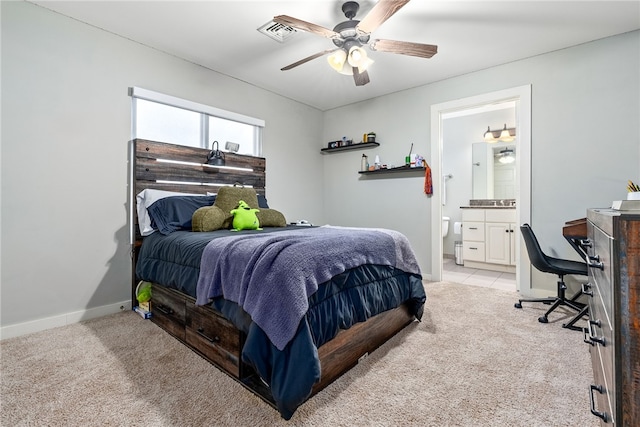 277 S Gay St Unit 601, Auburn, AL 36830 - carpeted bedroom with baseboards, ensuite bathroom, ceiling fan, and visible vents