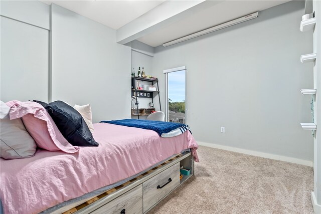 277 S Gay St Unit 601, Auburn, AL 36830 - bedroom featuring baseboards and carpet floors