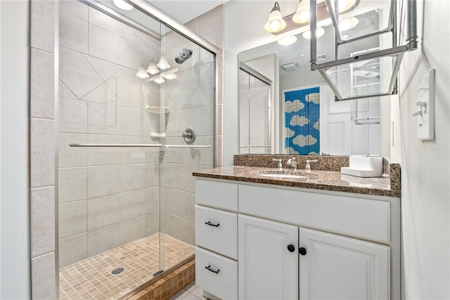 277 S Gay St Unit 601, Auburn, AL 36830 - bathroom with vanity and a stall shower
