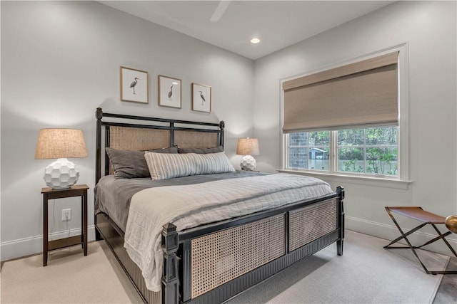 bedroom featuring light colored carpet, baseboards, ceiling fan, and recessed lighting