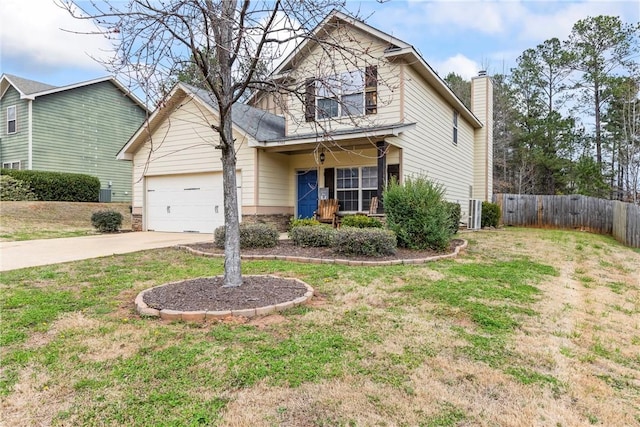 traditional home with fence, driveway, a chimney, a front lawn, and a garage