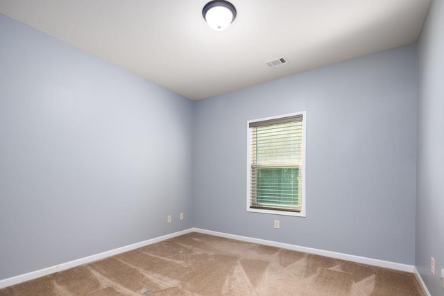 empty room featuring carpet floors