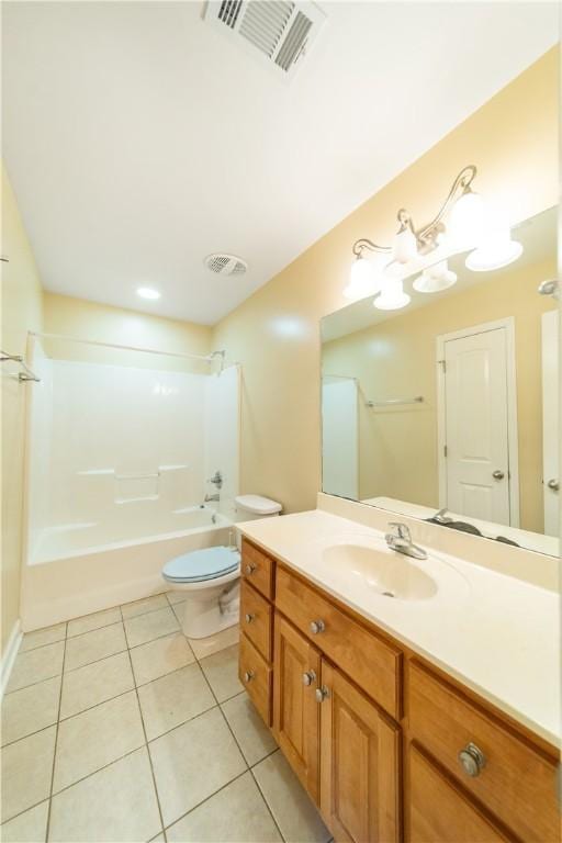 full bathroom with tile patterned floors, vanity, bathing tub / shower combination, and toilet