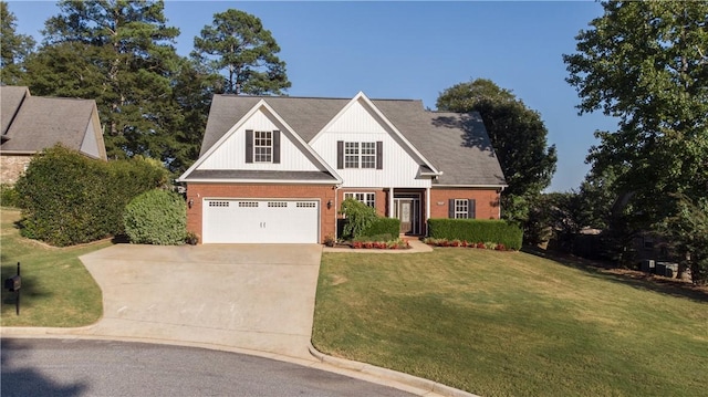 view of front of property with a garage and a front lawn