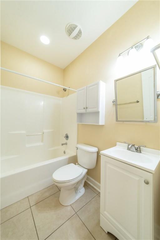 full bathroom with tile patterned flooring, vanity, toilet, and shower / bathtub combination