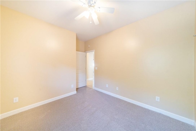 spare room with ceiling fan