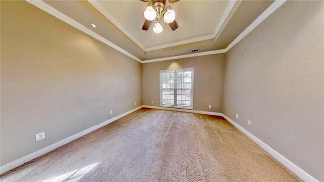 3666 Hawks Lndg, Auburn, AL 36804 - empty room featuring a tray ceiling, a ceiling fan, carpet flooring, and crown molding