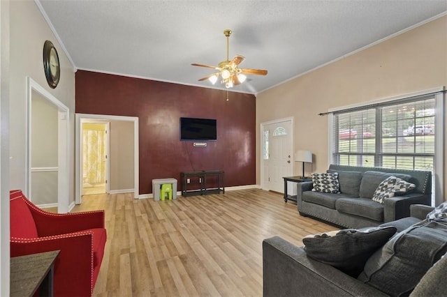 1417 Ridge Rd, Opelika, AL 36801 - living area featuring a ceiling fan, crown molding, and light wood-style flooring