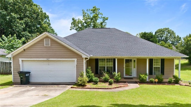 1417 Ridge Rd, Opelika, AL 36801 - view of front of house with an attached garage, a front yard, concrete driveway, and roof with shingles