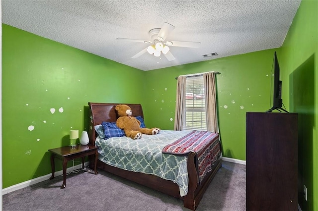 1417 Ridge Rd, Opelika, AL 36801 - carpeted bedroom featuring a textured ceiling and ceiling fan