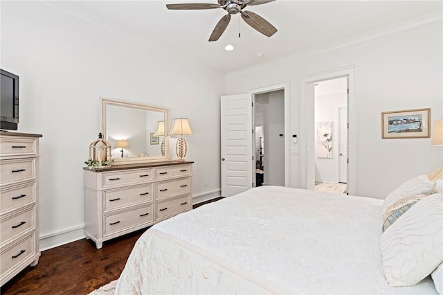 bedroom with dark wood-style floors, baseboards, ornamental molding, and ensuite bath