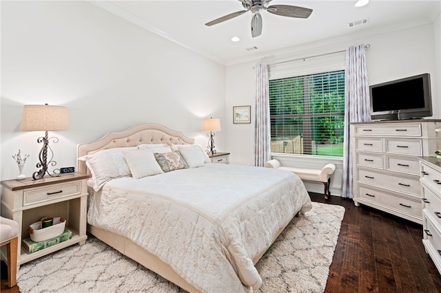 bedroom featuring ornamental molding, dark wood-type flooring, and visible vents