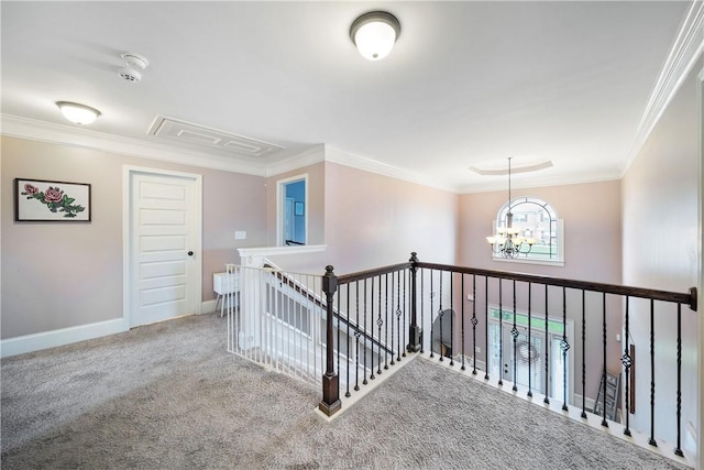 300 Holland Loop, Smiths Station, AL 36877 - corridor with a chandelier, carpet floors, crown molding, and an upstairs landing