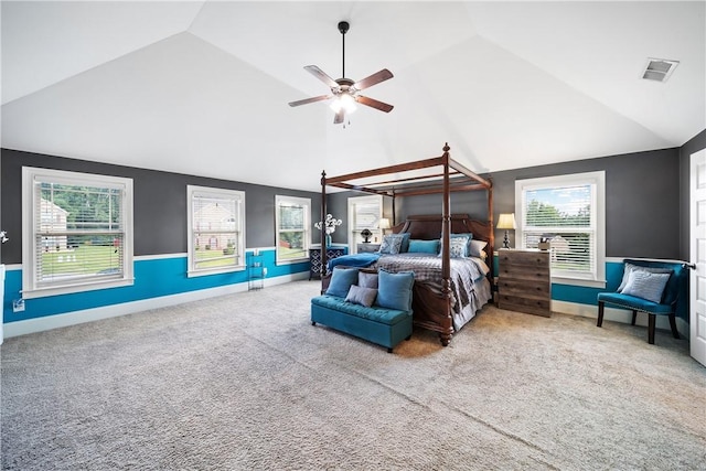 300 Holland Loop, Smiths Station, AL 36877 - bedroom with lofted ceiling, carpet flooring, multiple windows, and a ceiling fan