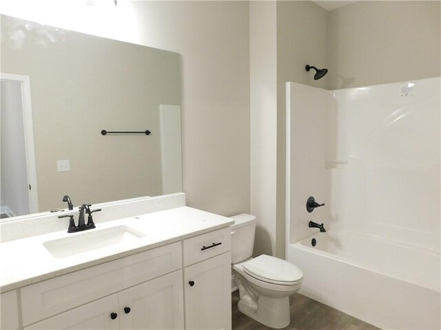 full bathroom with vanity, toilet, and shower / bath combination