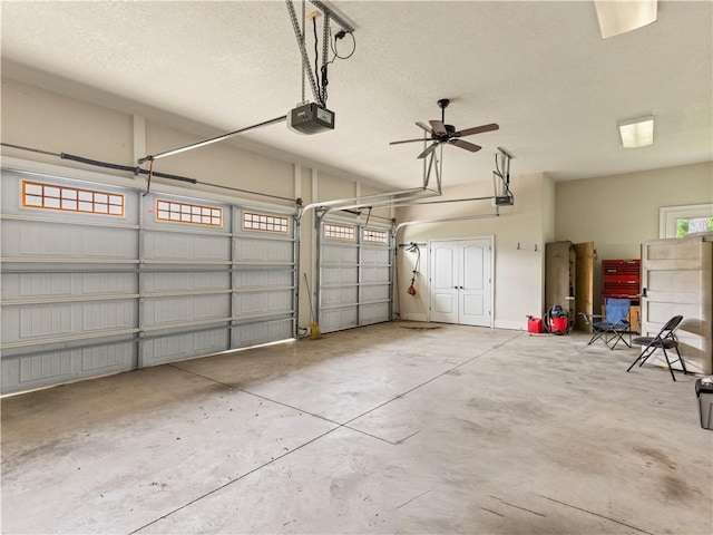 1655 Alex Ave, Auburn, AL 36030 - garage featuring a garage door opener and a ceiling fan