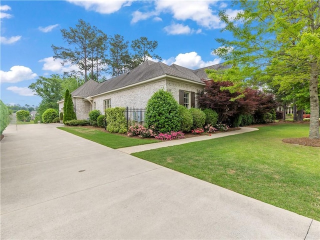 1655 Alex Ave, Auburn, AL 36030 - view of side of property featuring driveway and brick siding