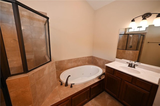 bathroom featuring tile patterned floors, vanity, and independent shower and bath