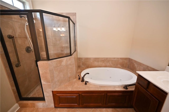 bathroom featuring separate shower and tub, tile patterned floors, and vanity