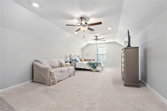 carpeted bedroom featuring ceiling fan and lofted ceiling