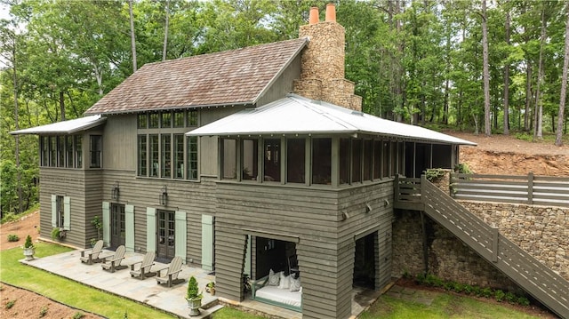 rear view of house with a patio area