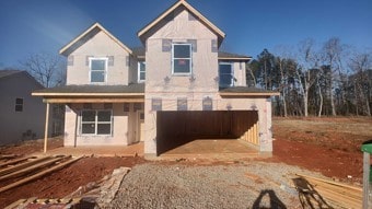 view of front of house featuring a garage and driveway