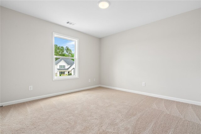 750 Mcdonald Dr, Opelika, AL 36801 - unfurnished room featuring baseboards and carpet flooring