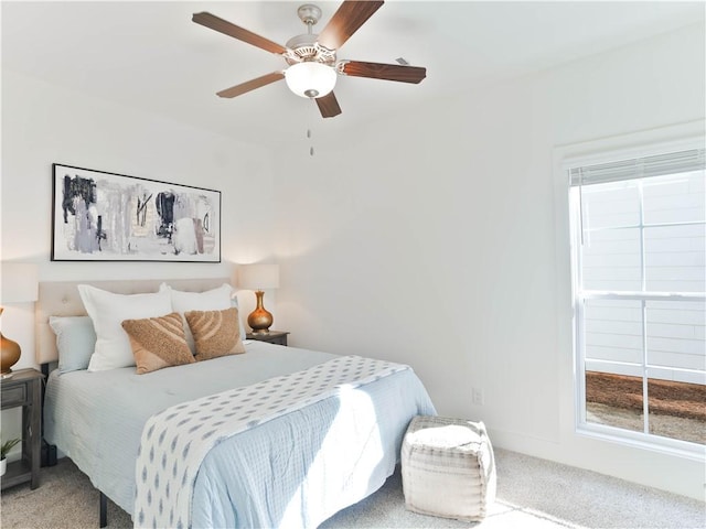 bedroom featuring ceiling fan and carpet floors