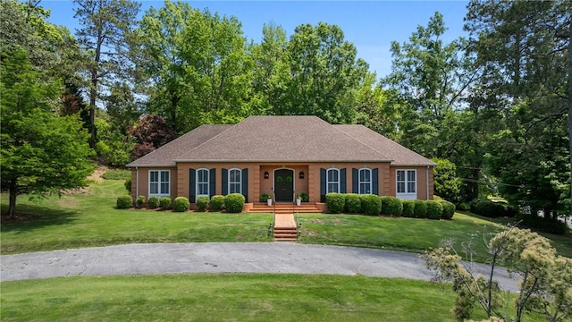 613 5th Ave, Opelika, AL 36801 - view of front of home with a front yard