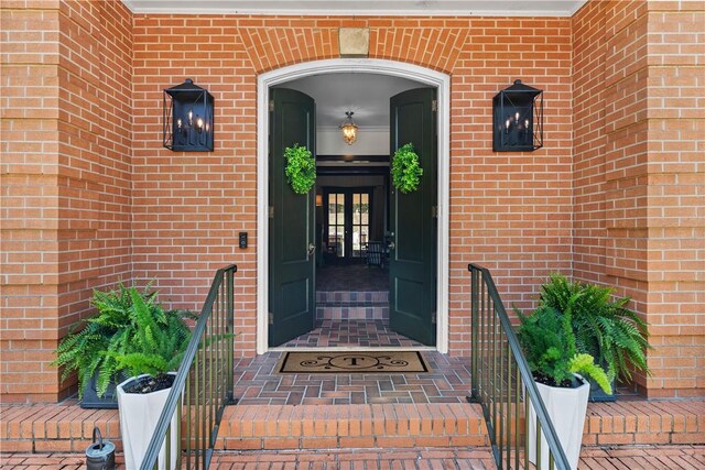 613 5th Ave, Opelika, AL 36801 - doorway to property featuring french doors and brick siding