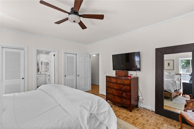 613 5th Ave, Opelika, AL 36801 - bedroom featuring ornamental molding, multiple closets, ensuite bathroom, a ceiling fan, and baseboards