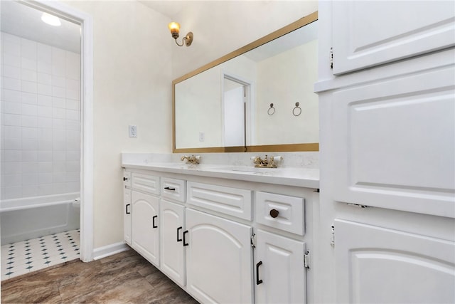 158 Alice Cir, Auburn, AL 36830 - bathroom with double vanity and washtub / shower combination