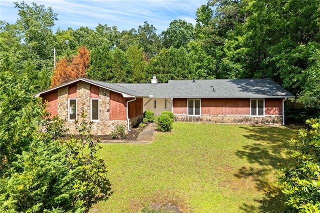 158 Alice Cir, Auburn, AL 36830 - view of front of house with stone siding, a front lawn, and a chimney