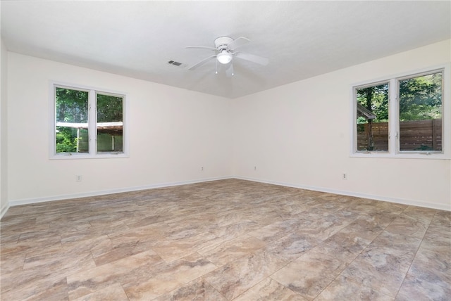 158 Alice Cir, Auburn, AL 36830 - spare room with ceiling fan and baseboards