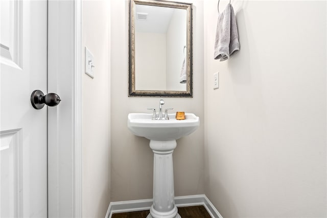 1803 Solamere Ct, Auburn, AL 36832 - bathroom with baseboards and wood finished floors