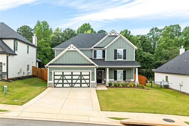 1803 Solamere Ct, Auburn, AL 36832 - craftsman-style home featuring board and batten siding, driveway, stone siding, and central air condition unit