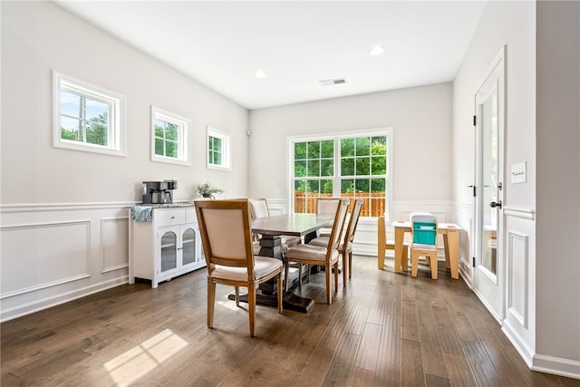 1803 Solamere Ct, Auburn, AL 36832 - dining room featuring a decorative wall, wainscoting, dark wood-style flooring, and recessed lighting