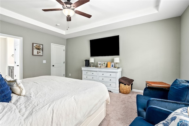 1803 Solamere Ct, Auburn, AL 36832 - carpeted bedroom with a raised ceiling, a ceiling fan, and ensuite bathroom