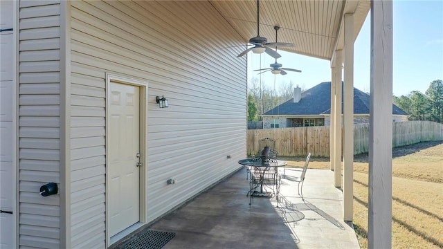 view of patio featuring ceiling fan