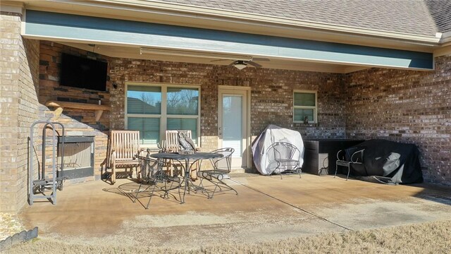 view of patio with ceiling fan