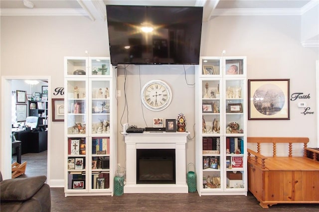 living room with crown molding and dark hardwood / wood-style floors