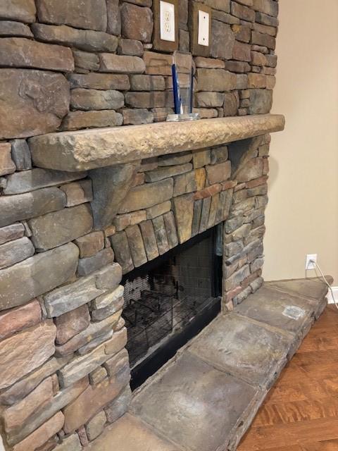 details featuring a stone fireplace