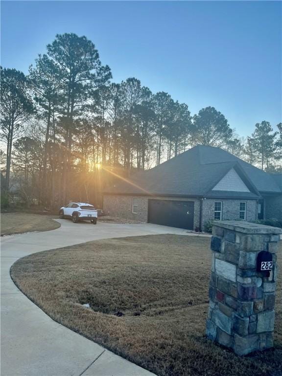 exterior space featuring a garage and driveway