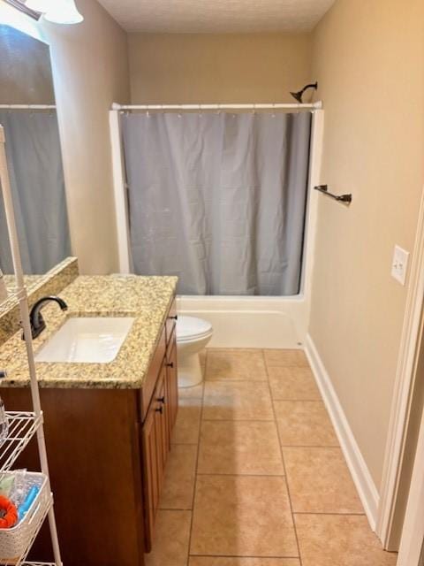 full bathroom with tile patterned flooring, toilet, shower / tub combo, vanity, and baseboards