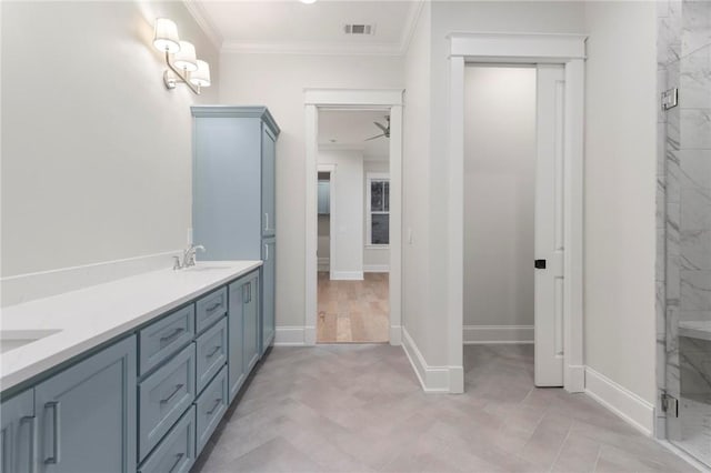 3547 Eagle Trl, Opelika, AL 36801 - full bath featuring a marble finish shower, ornamental molding, double vanity, and baseboards