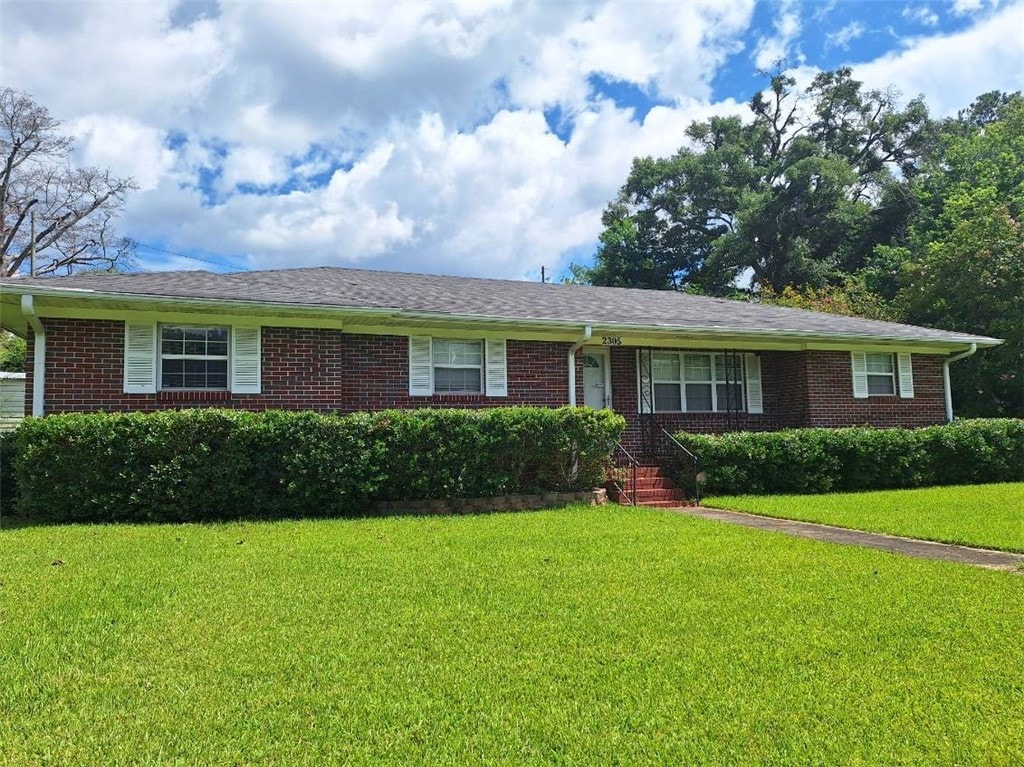 2305 61st St, Valley, AL 36854 - ranch-style home featuring brick siding and a front yard