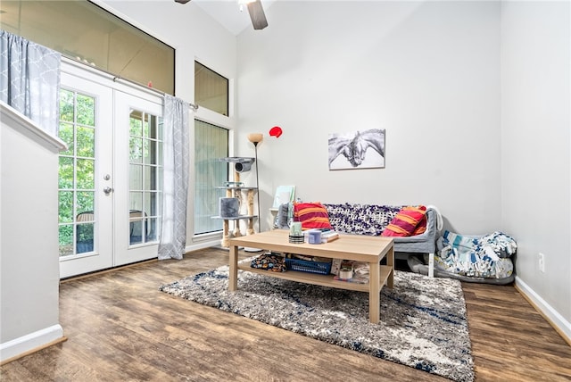 1041 Stonegate Dr Unit C, Auburn, AL 36830 - living room featuring french doors, wood finished floors, baseboards, ceiling fan, and a towering ceiling