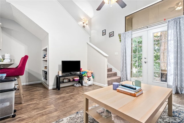 1041 Stonegate Dr Unit C, Auburn, AL 36830 - living area with a ceiling fan, wood finished floors, stairs, built in shelves, and baseboards
