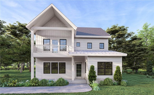 106 Cheyenne Ln, Dadeville, AL 36853 - view of front facade with a front lawn, a balcony, and metal roof