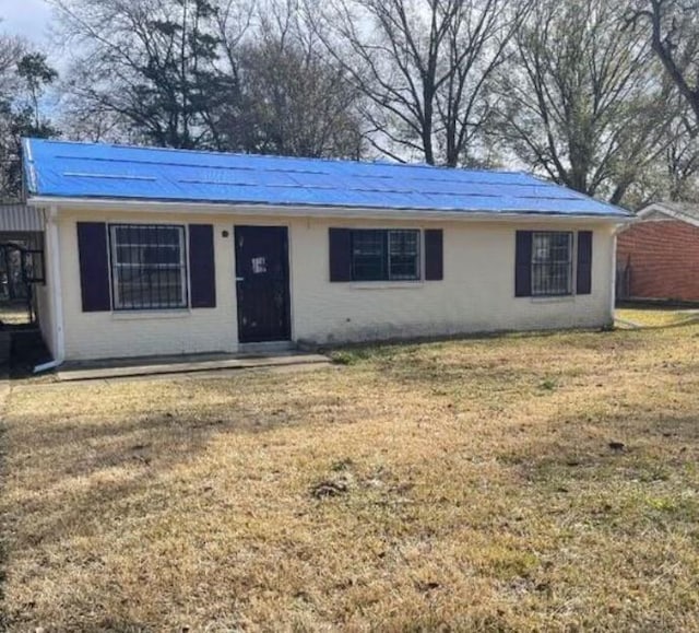 ranch-style home with a front yard